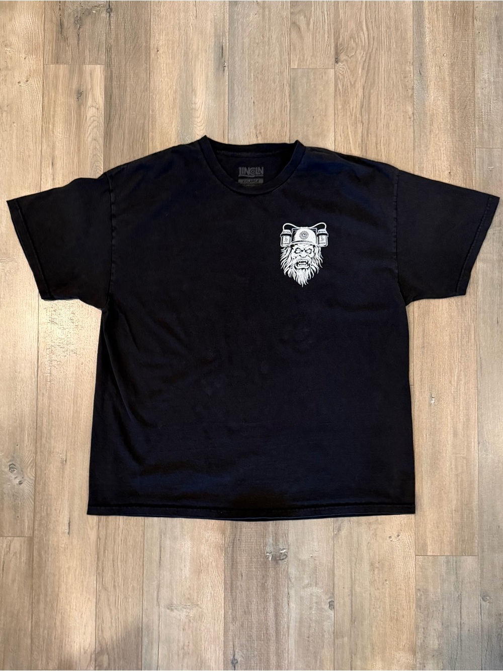 Men's Black Short-Sleeve Graphic Tee with Pocket-Left Illustration